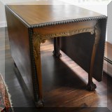 F07. Double drop leaf gateleg table with ball-and-claw feet. 30”h x 42”w x 76”d 